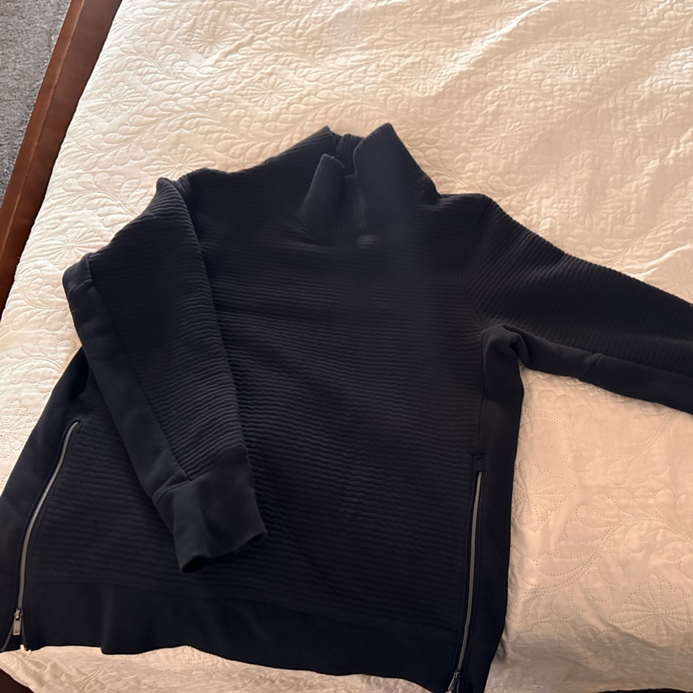 Black athletic sweater